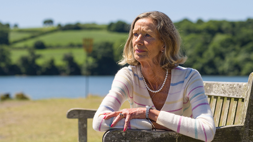 Liz Lane sitting outside