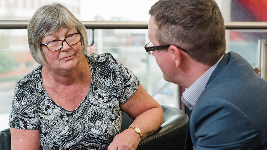 Solicitor talking to a client