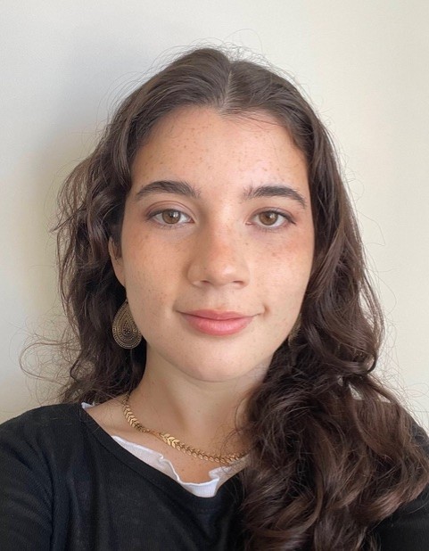 Headshot of a young female PhD student.