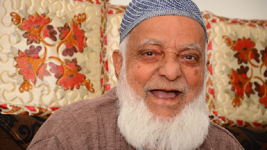 A man, Syed, smiling