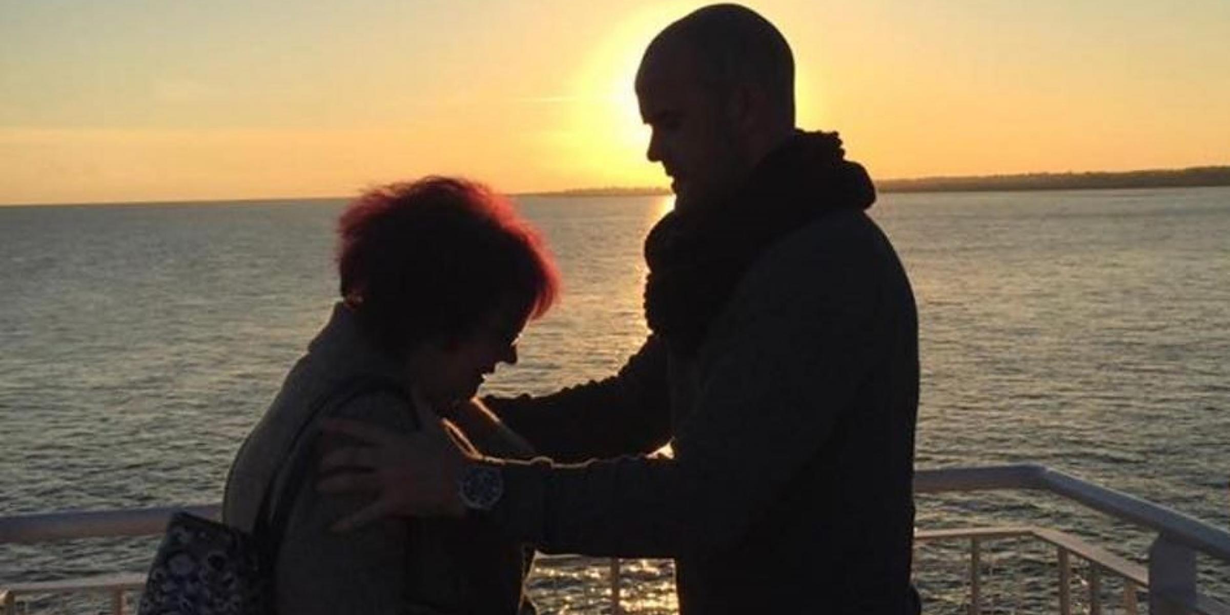 Neil with his mum at sunset