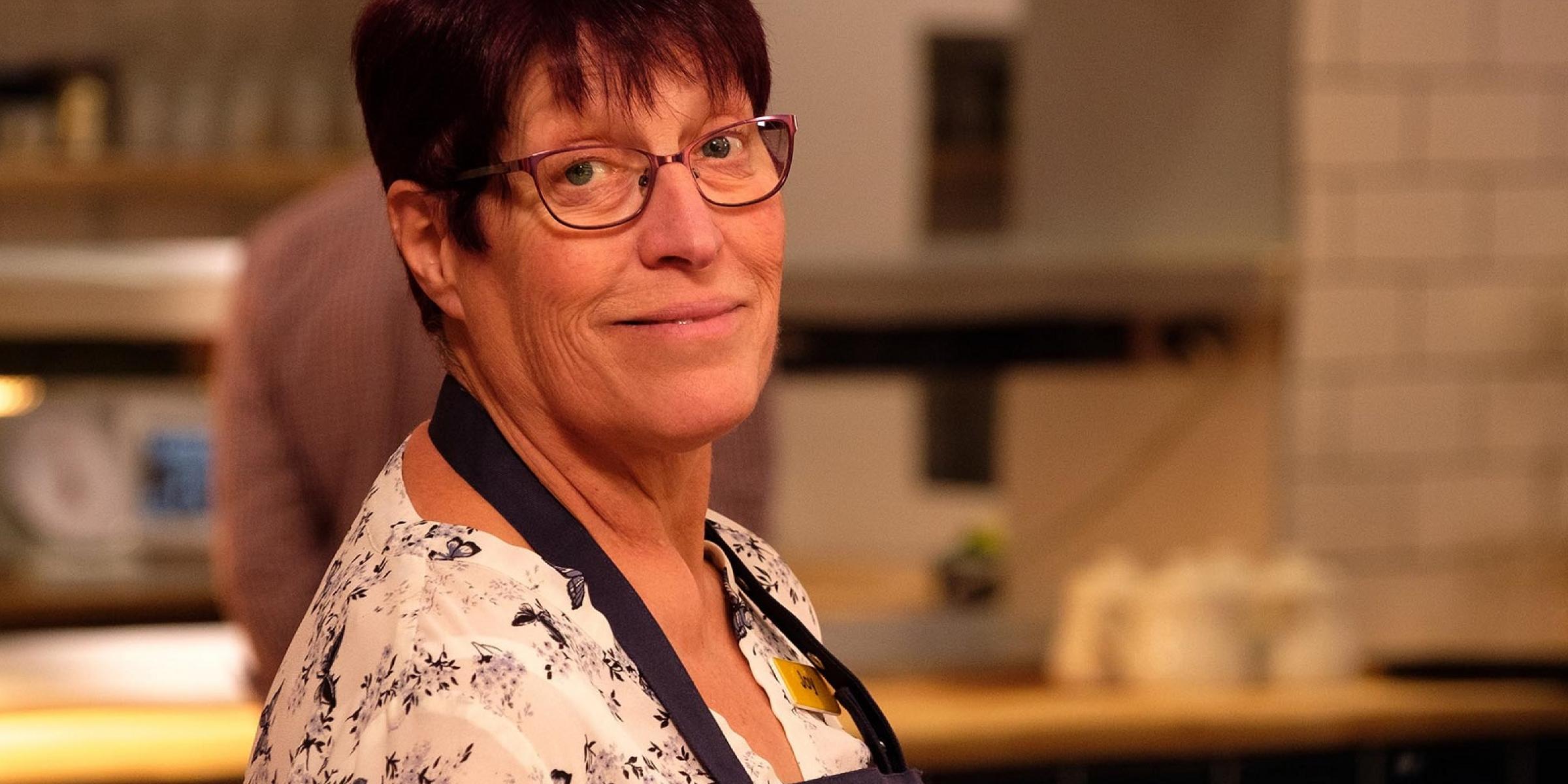 Joy working at the restaurant