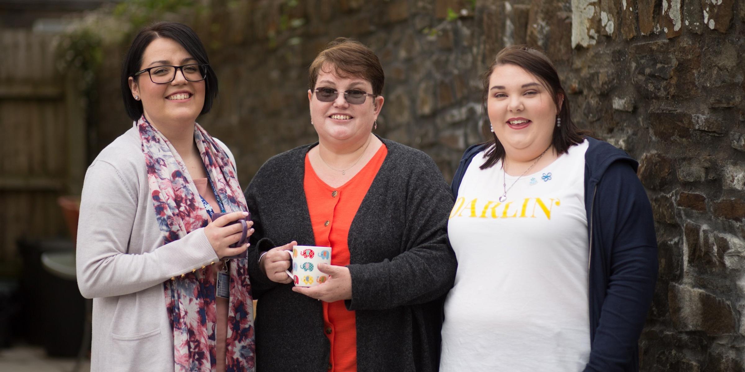 Amanda with her daughter and Dementia Support Worker