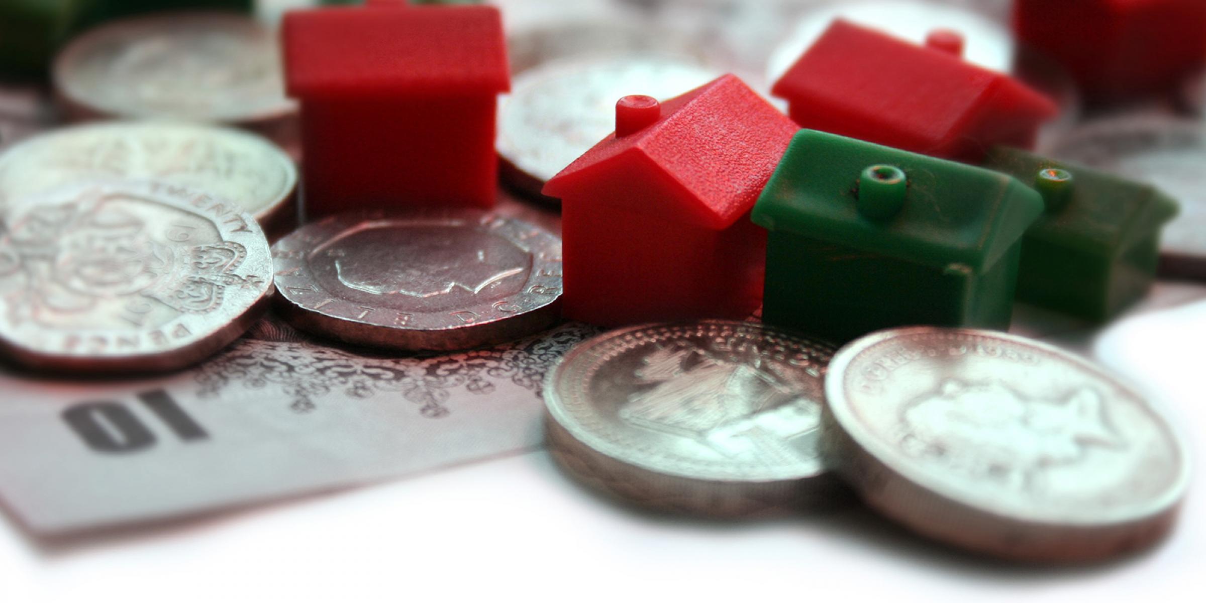 Money and Monopoly pieces