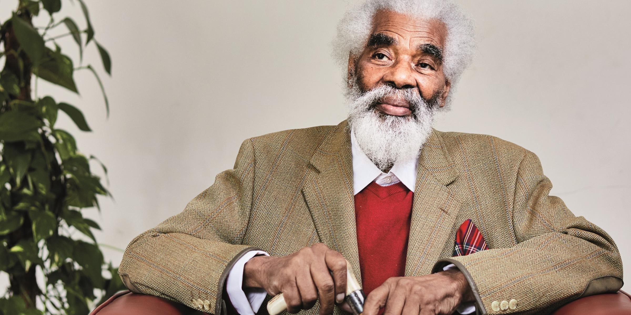 Charles sitting in an armchair