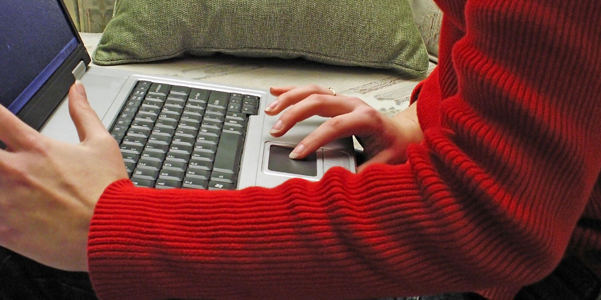 Someone using a laptop