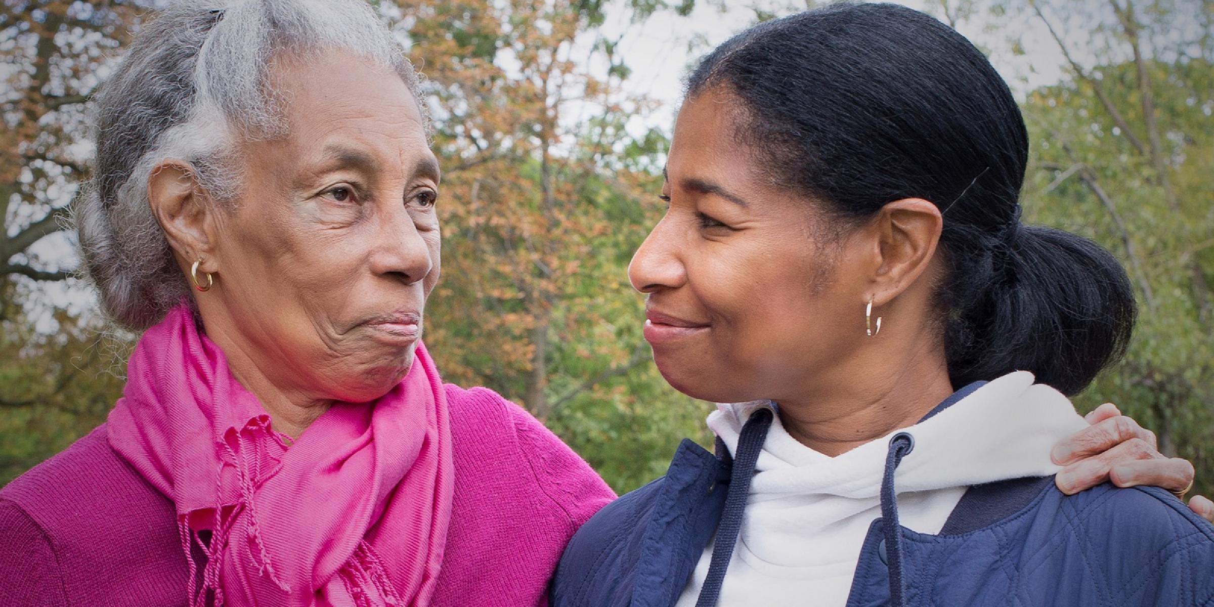 A close-up of Daphne with her arm around her daughter, Michelle