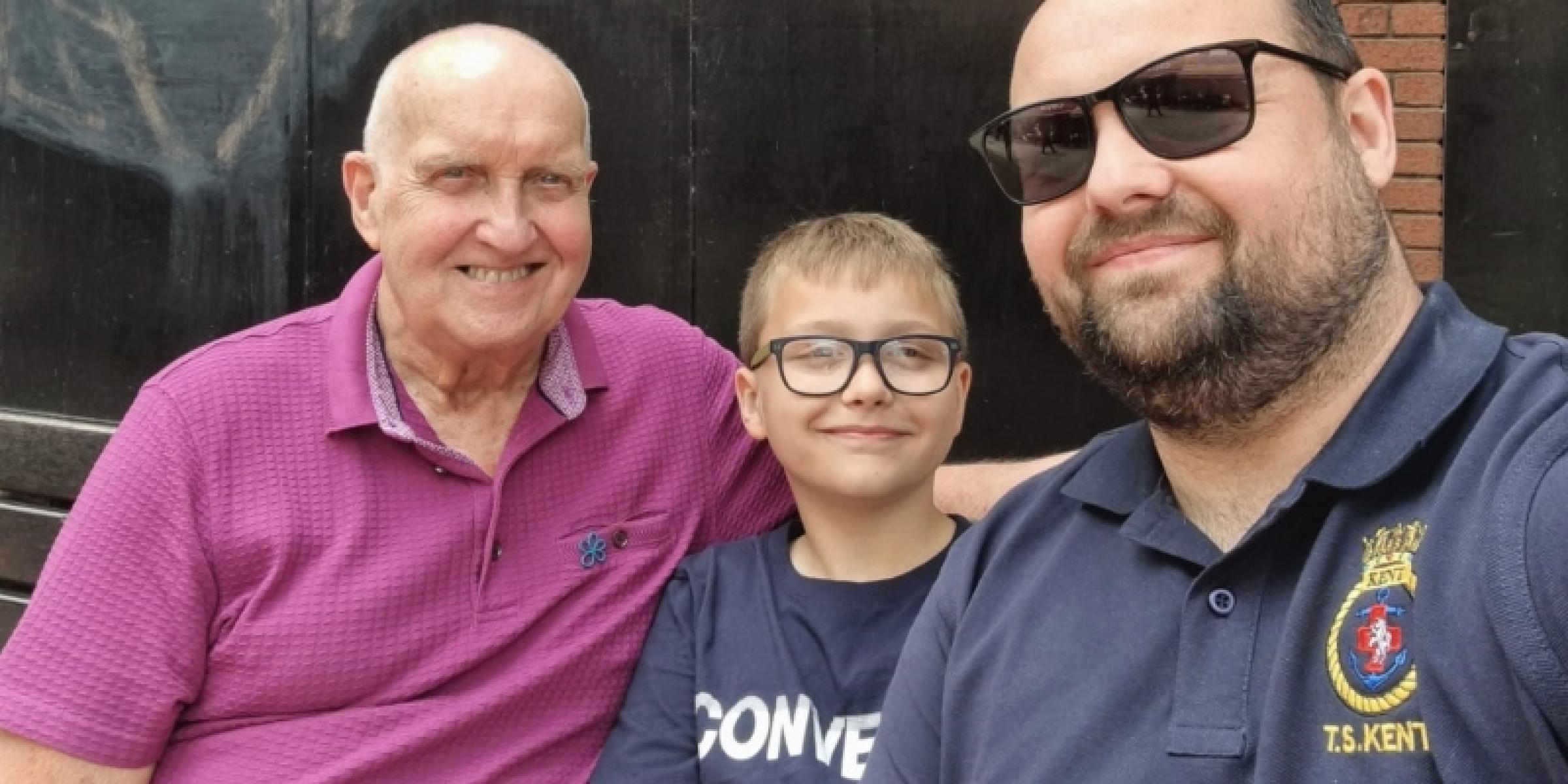 Keith Day sat with his family