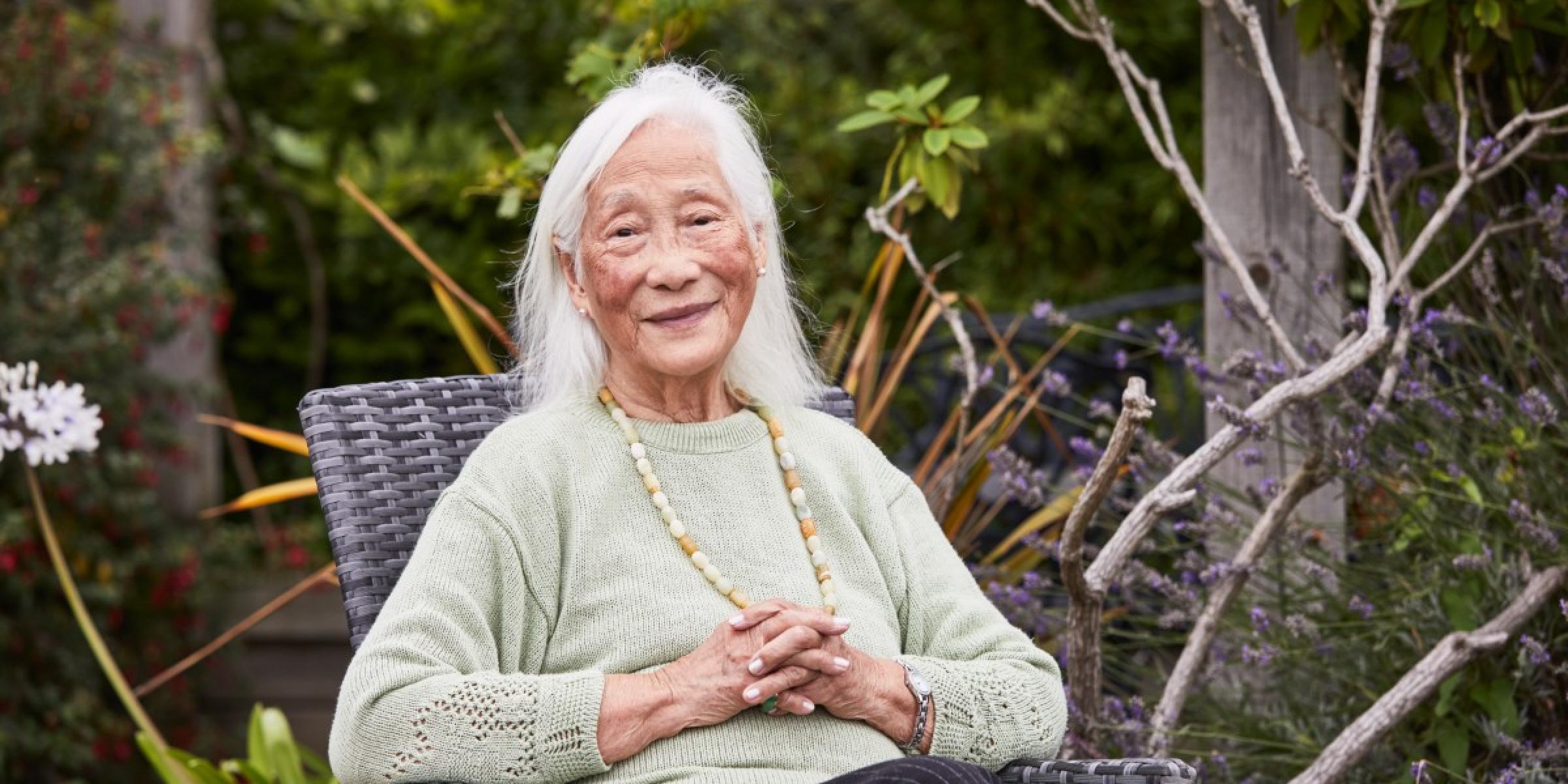 Annie Chinfen sitting in a chair outside