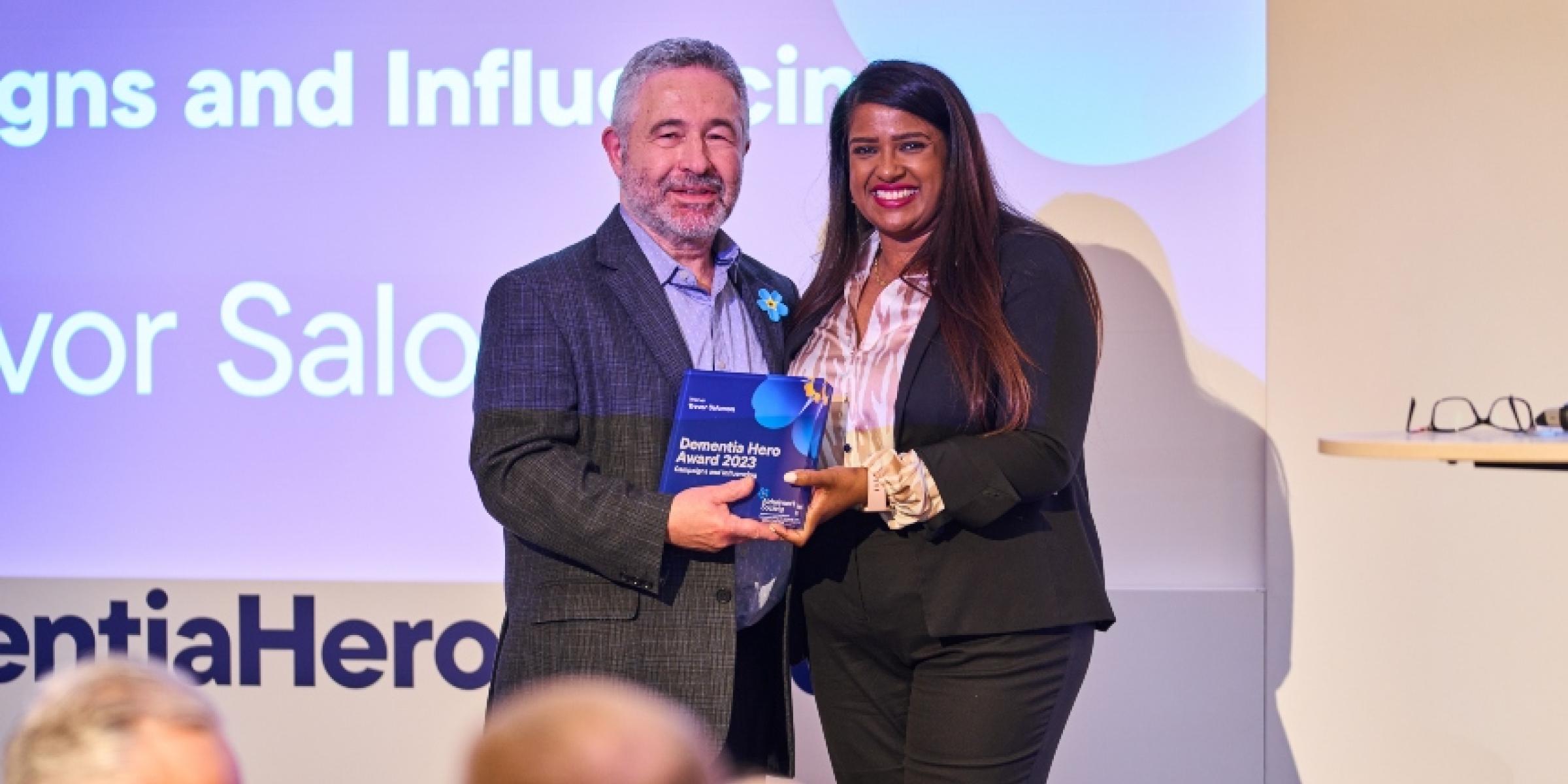 Trevor receiving his award