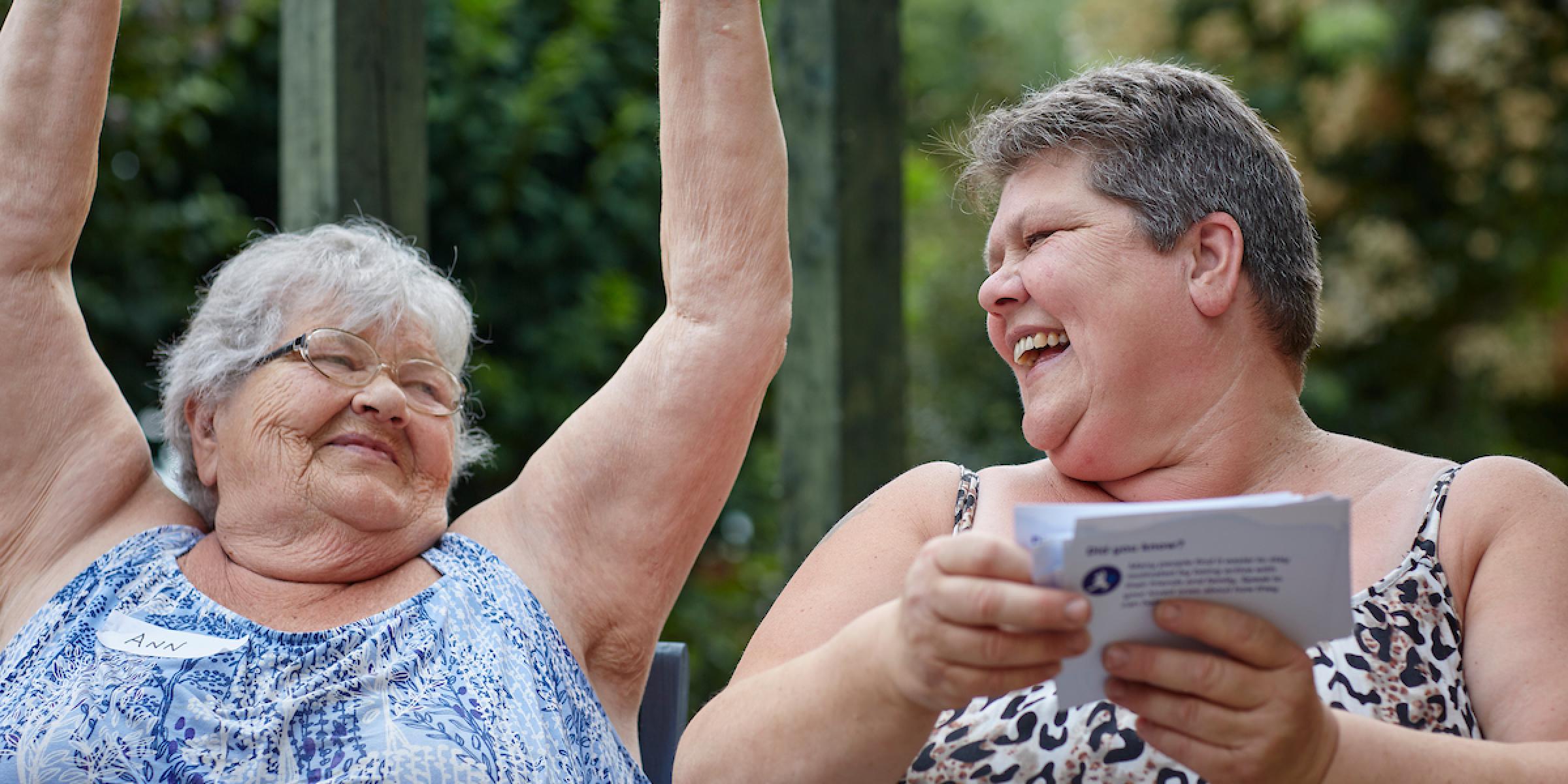 Ann and Tricia use the Movement Deck in the garden