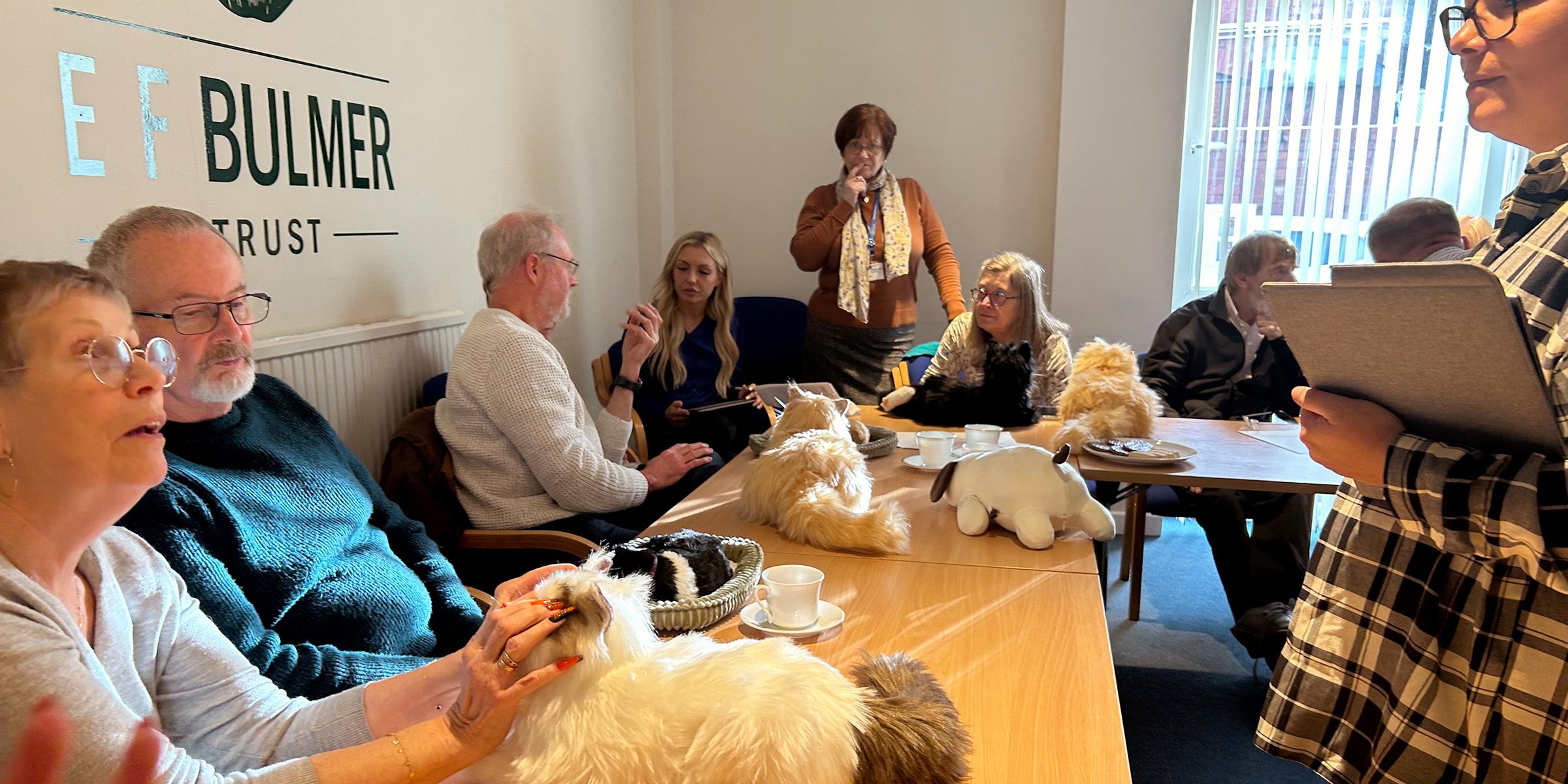 People with dementia trying out lifelike pets