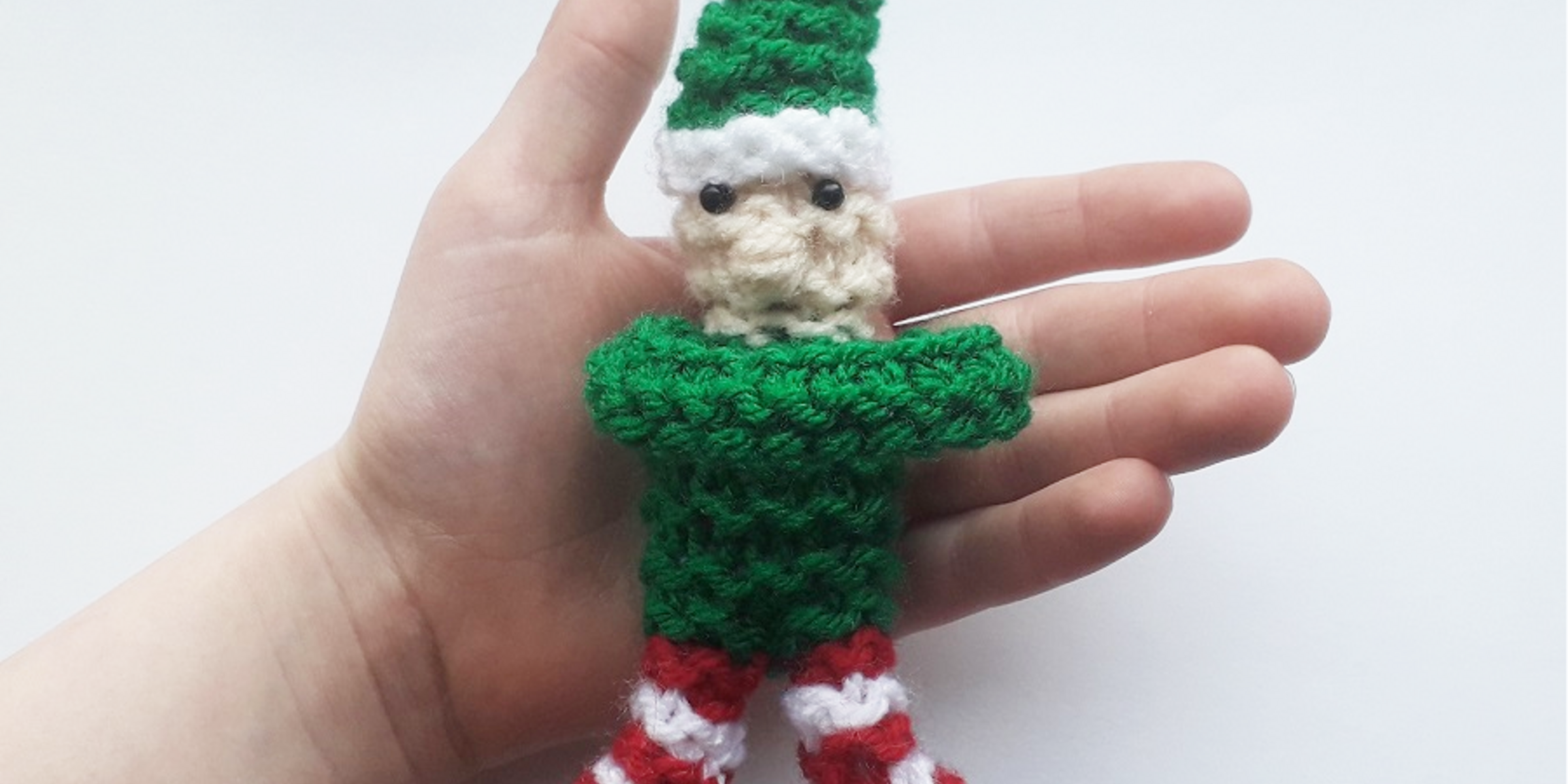 Snuggle Elf in a hand