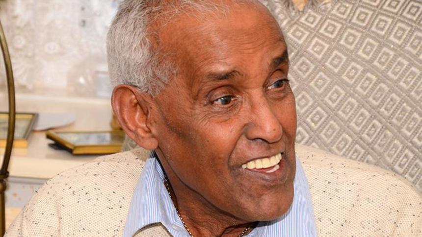 Abdul-Fady Othman smiling in conversation