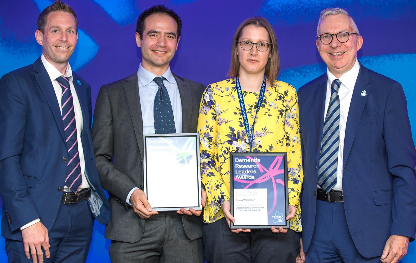 Dr Daniel Davis and Dr Emma Wolverson smiling with their certificates 