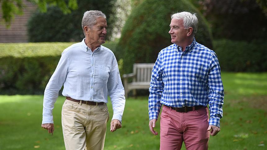 Elmar and his partner David walking outside.