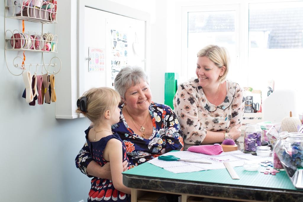 Pamela at home with family