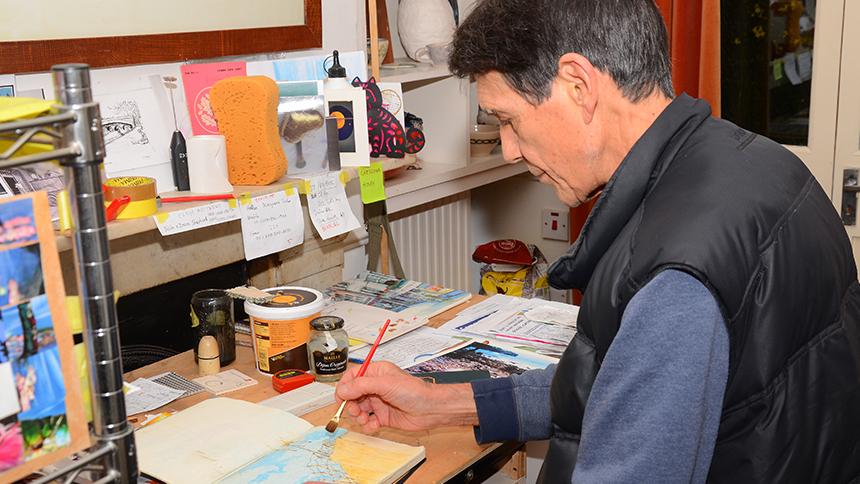 Nicky Stephens working at his desk