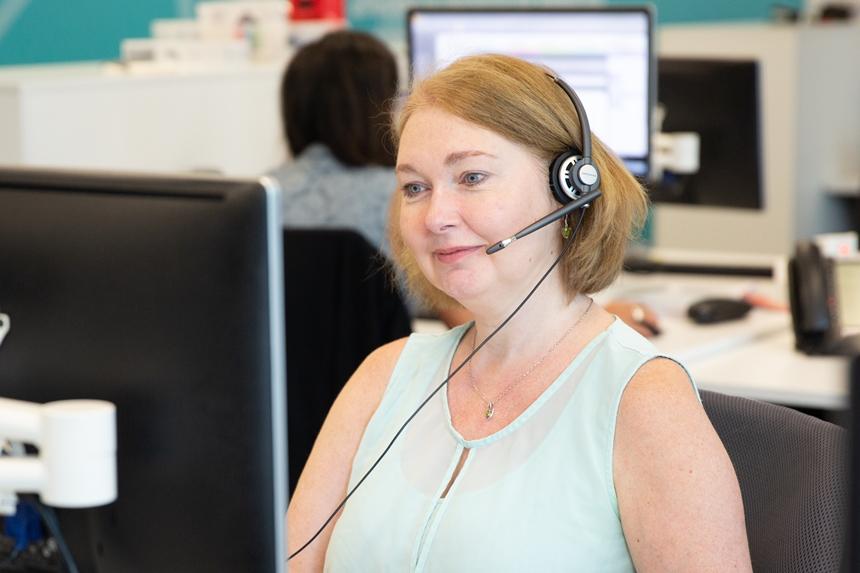 Woman with a phone head-set