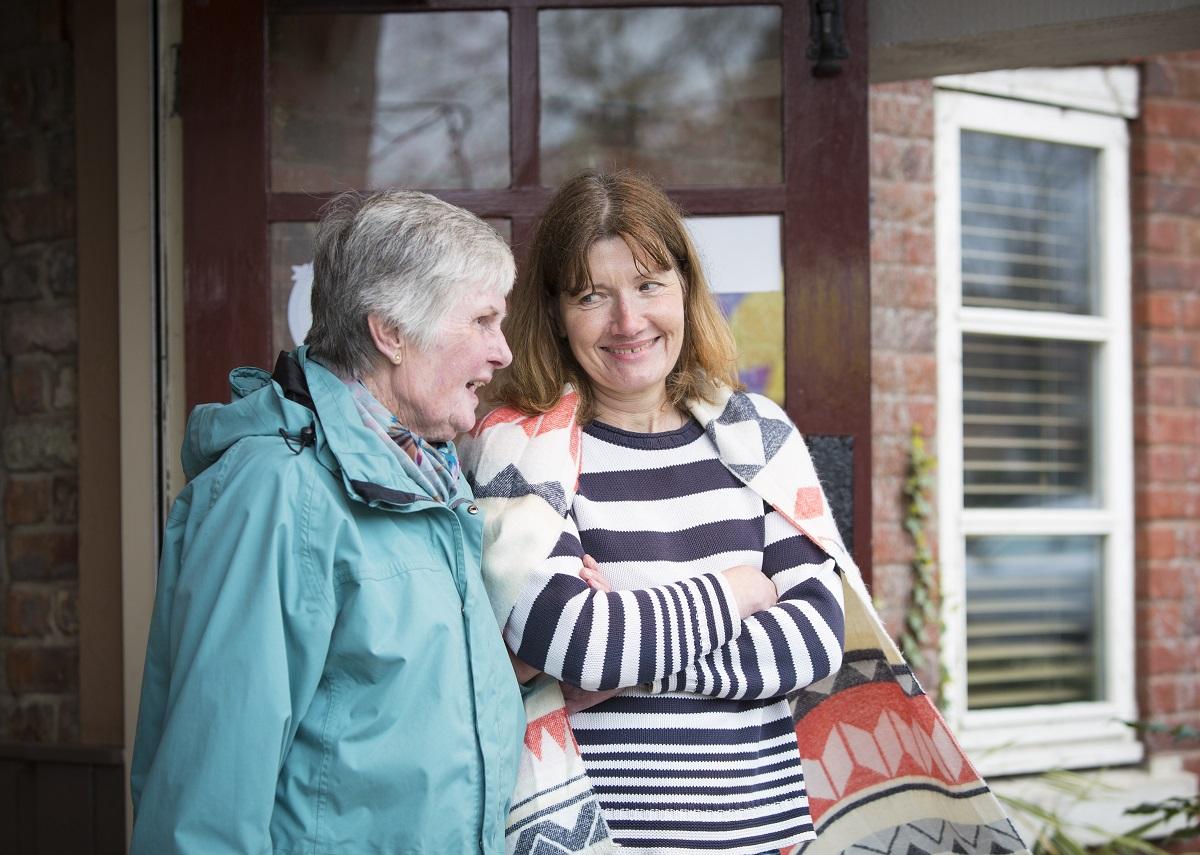 A woman with dementia and a volunteer