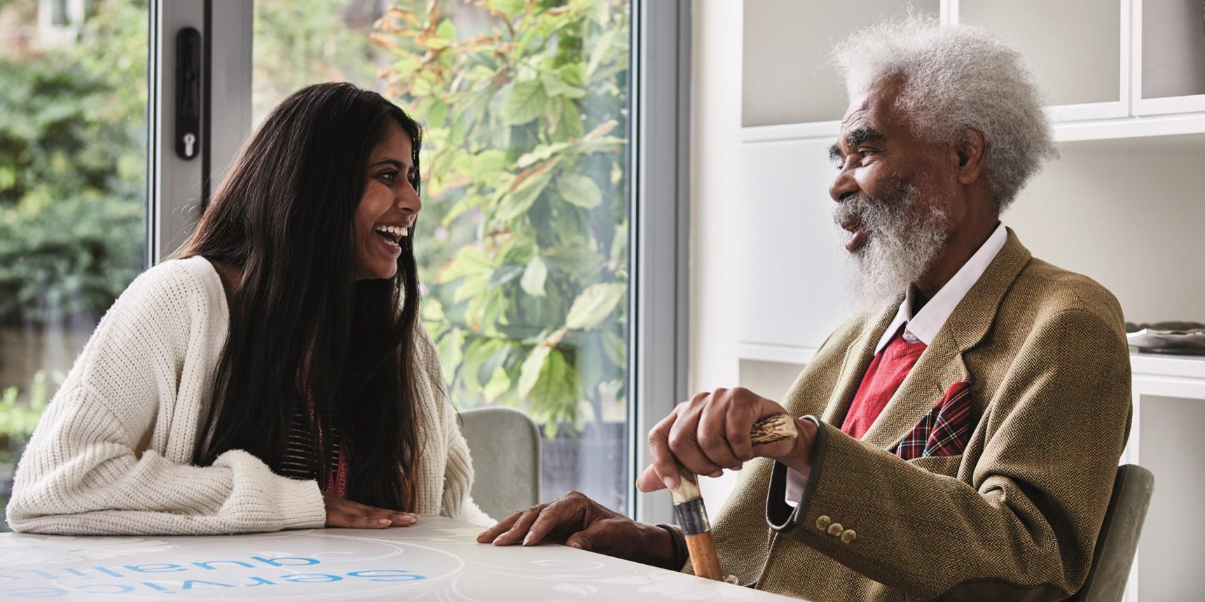 Charles and Taiyaba laughing together