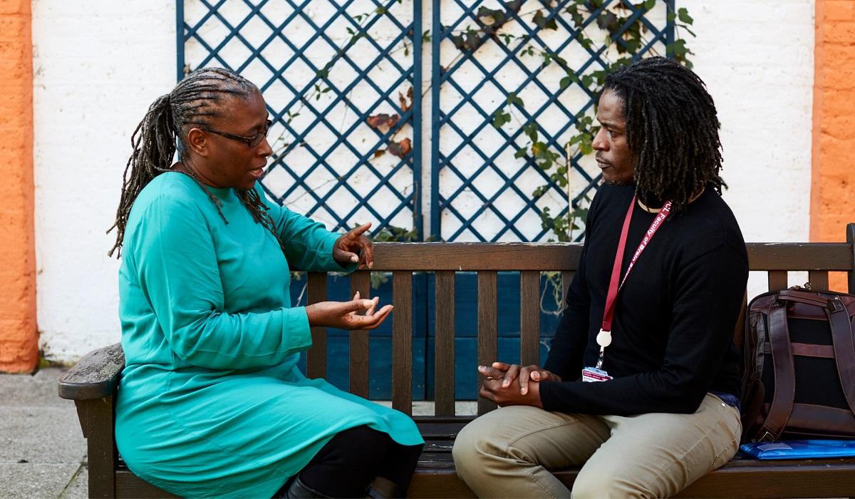 Moise Roche listening to a research participant