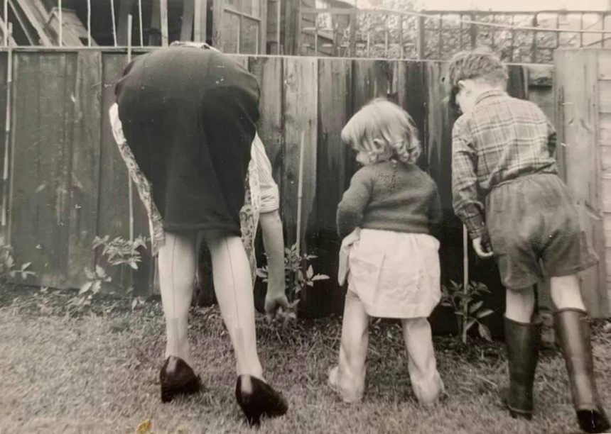 Julie's mum, Eileen, in the garden with two of her children