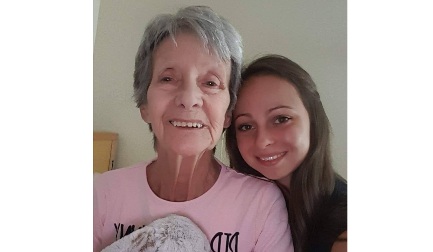 Aimee smiling with her grandmother