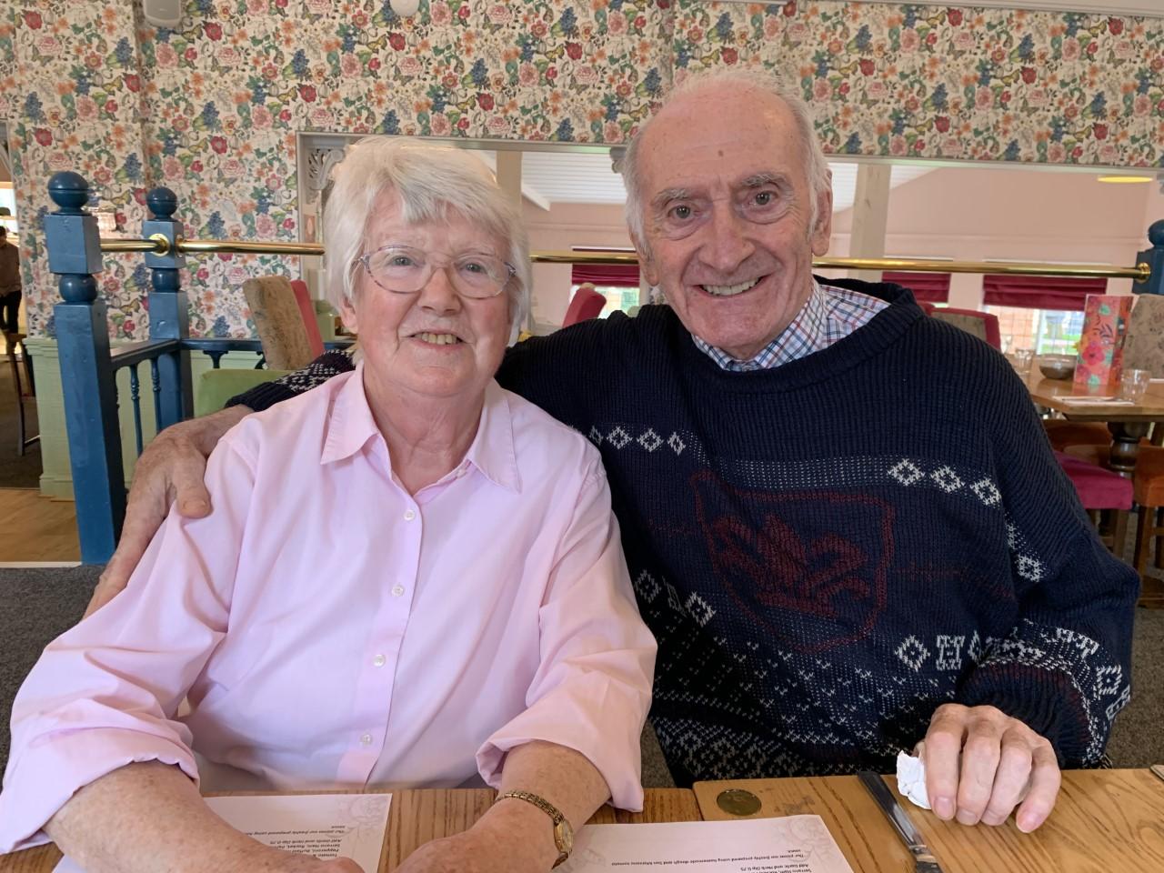 John and Ellen reunited, having a meal together