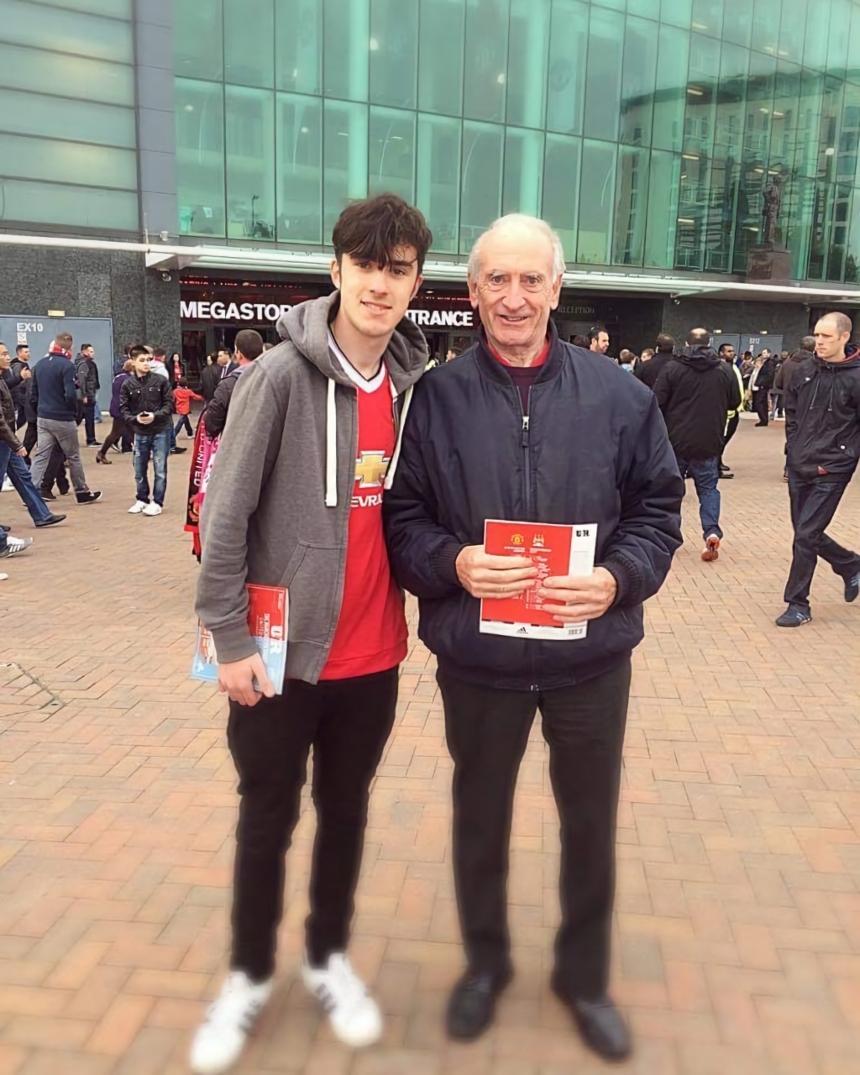 Tom and his grandad, John, at the football together
