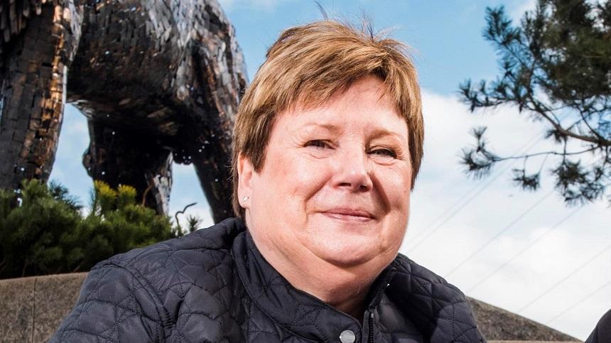 Emily smiling to camera