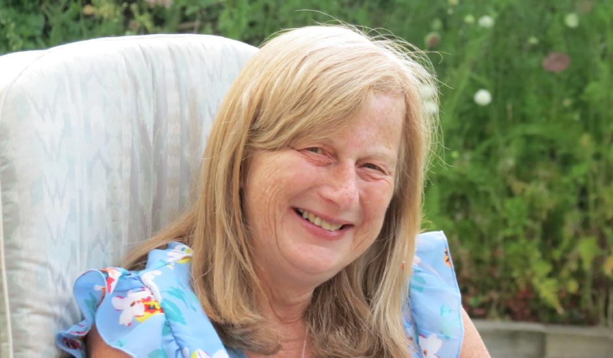 Yvonne in the garden smiling