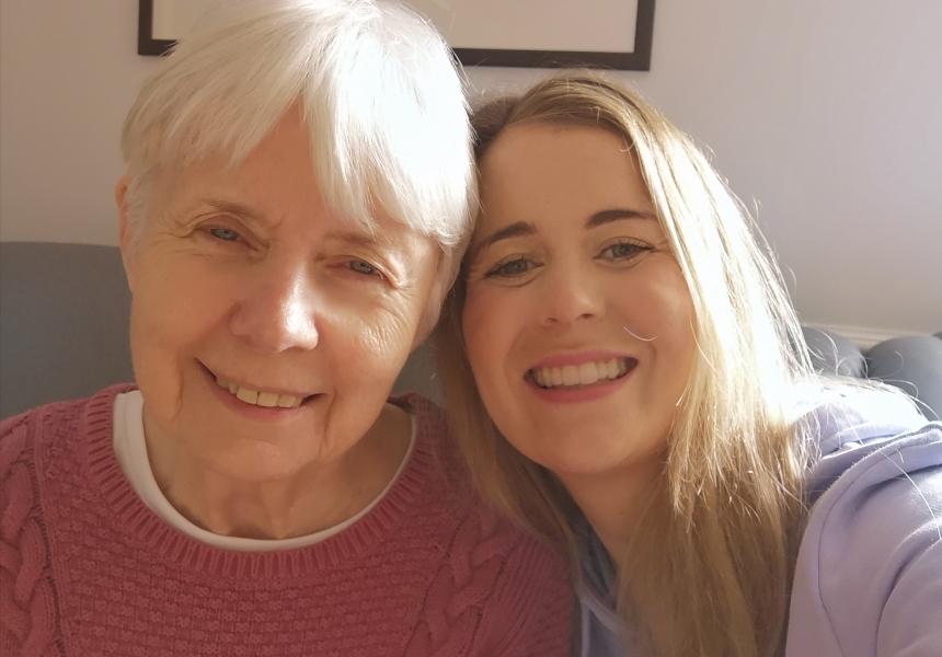 Lara and her mum Sandee, smiling while taking a selfie