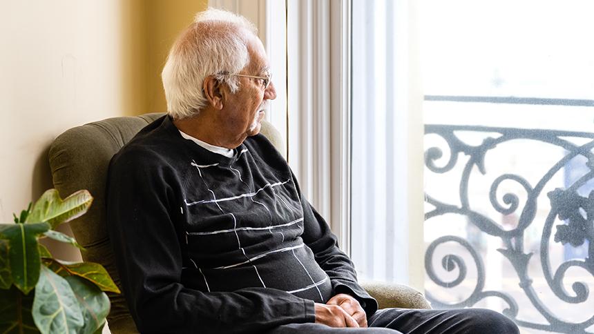 Rashmi Paun looks out to see from his lounge in Brighton