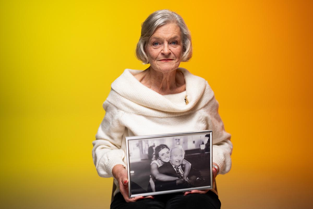 This is our dementia storyteller Liz with a photo of her husband