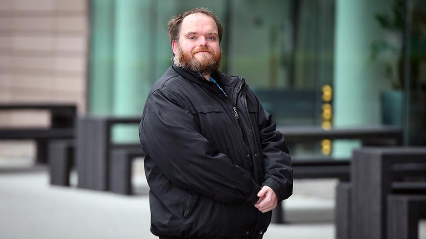 Adam Joesbury stands outside in Birmingham