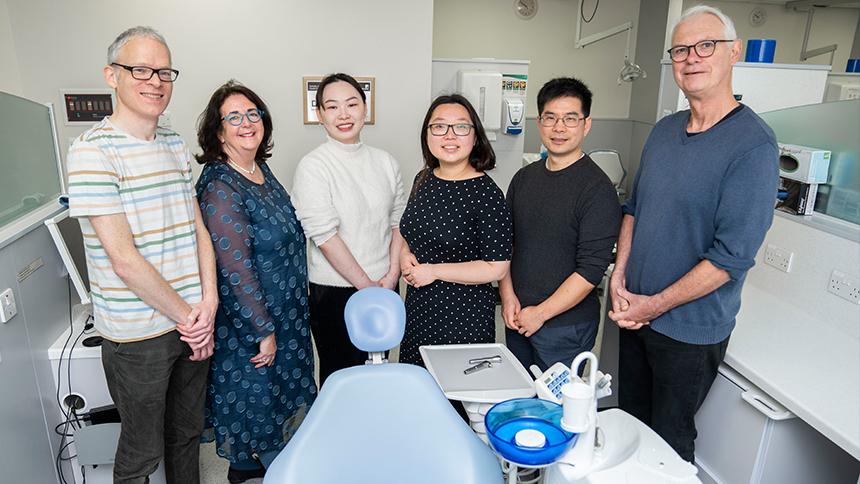 Chenyi and Jing (third and fourth from left) with their team.