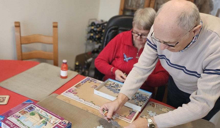 Helen and Ray do a jigsaw