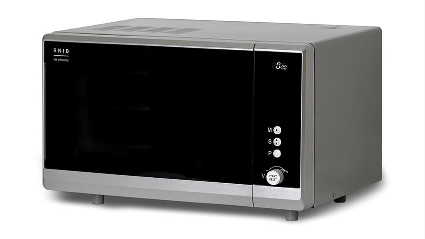 A silver microwave with a black door.