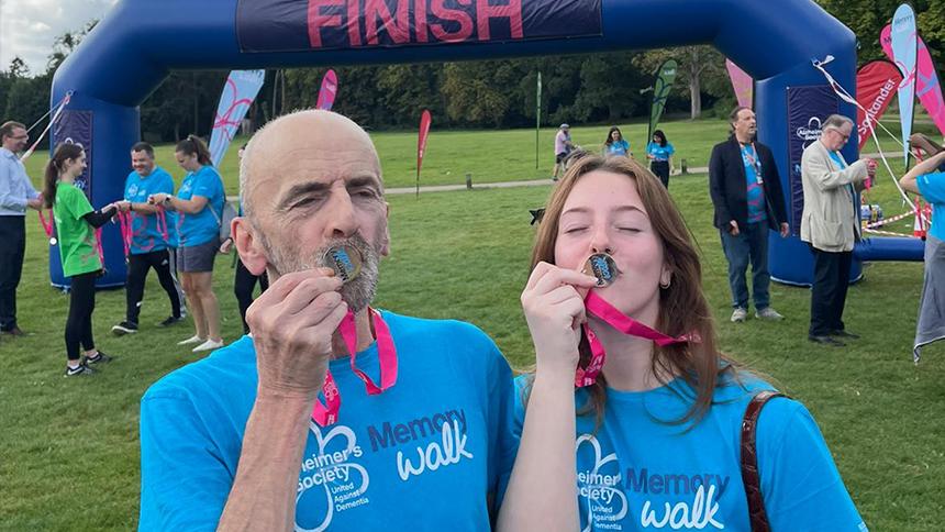 Mick Lambert with his daughter