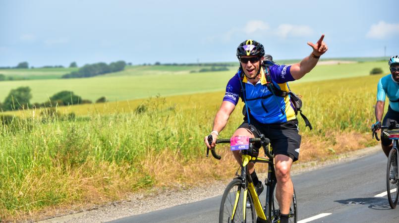 Solo male cyclist in the countryside