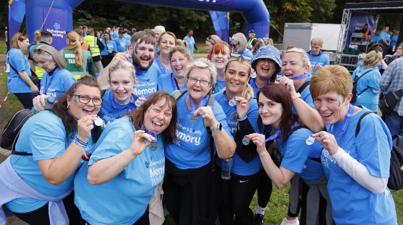 A group of women with their Memory Walk medals after completing the walk