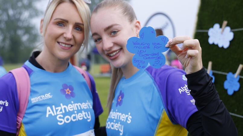 2 women in Alzheimer's Society tops